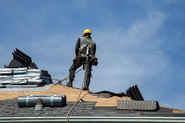 Professional Flat Roof Repair technician working in College Station, TX